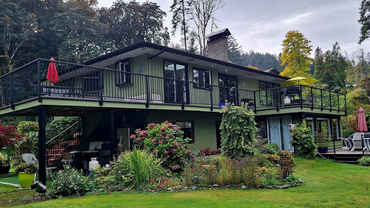 Heriot Bay House | Spectacular beach front property with stunning view of coastal mountains. n