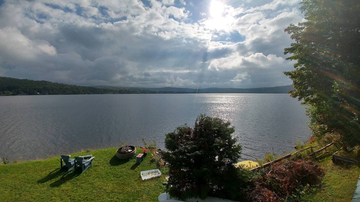 Saint-Hermenegilde Cottage | Spectacular Lakehouse with mountain views own sandy beach on crystal clear lake