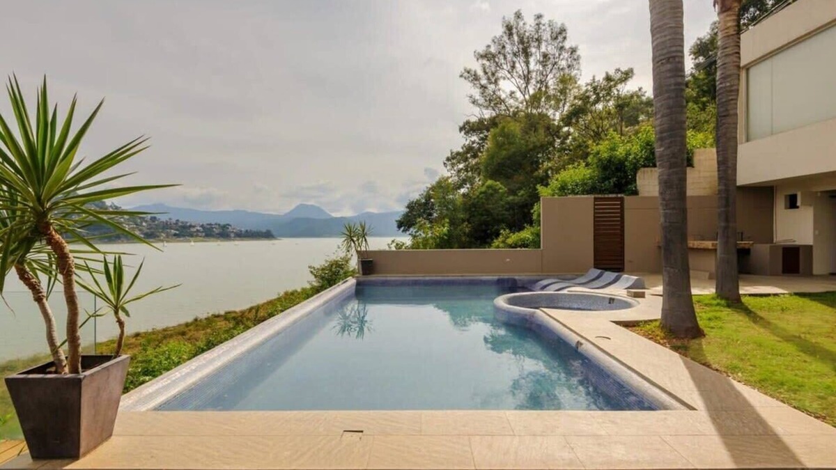 El Santuario House | Spectacular lakefront home with pool