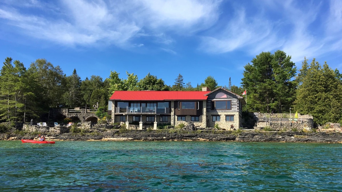 Lion's Head Cottage | Spectacular views- Stone Cottage, steps to the water, heated pool, pet friendlyn