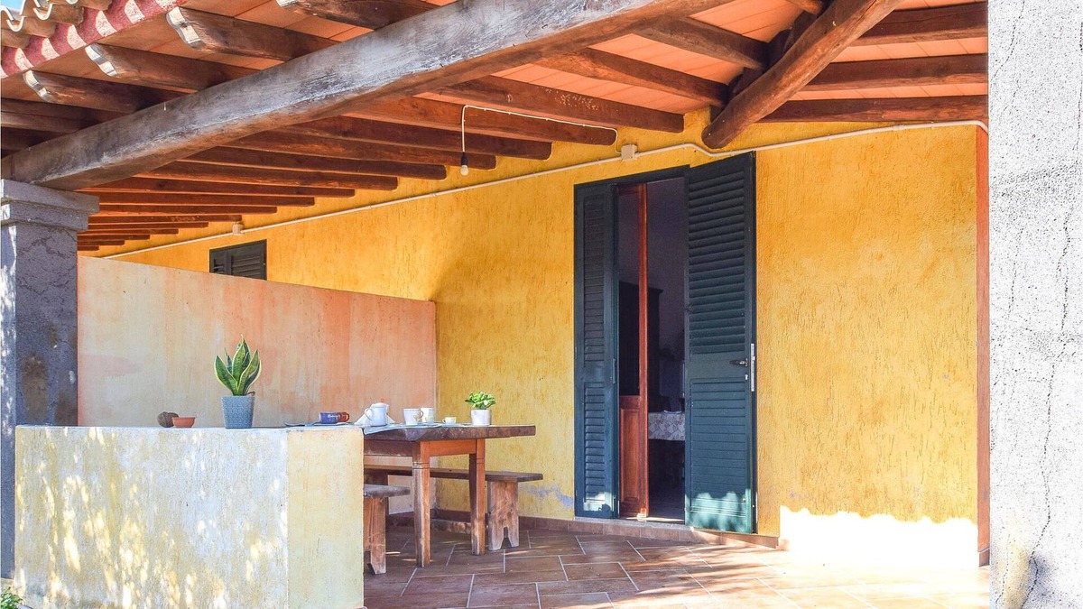 Orosei House | Spend an unforgettable vacation in this inviting cottage with beautiful views of the countryside.