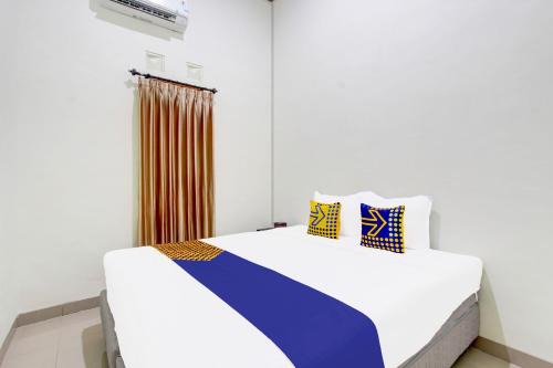 Cepu Hotel | SPOT ON 94076 Tinampi House Syariah