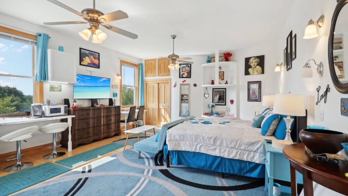 Fort Atkinson Villa | Starlight Tower Hot Tub King Suite with 8-Jet Massage Shower by RedAwning