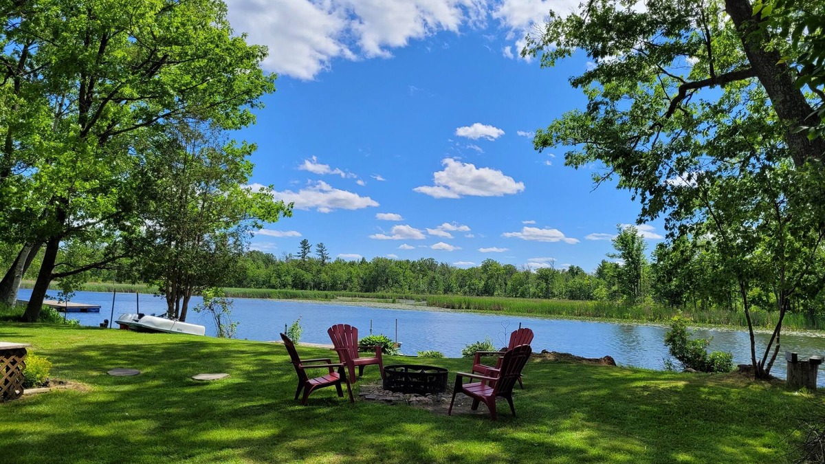 Campbellford Cottage | Start each morning on the porch with warm sunshine and beautiful waterfront view