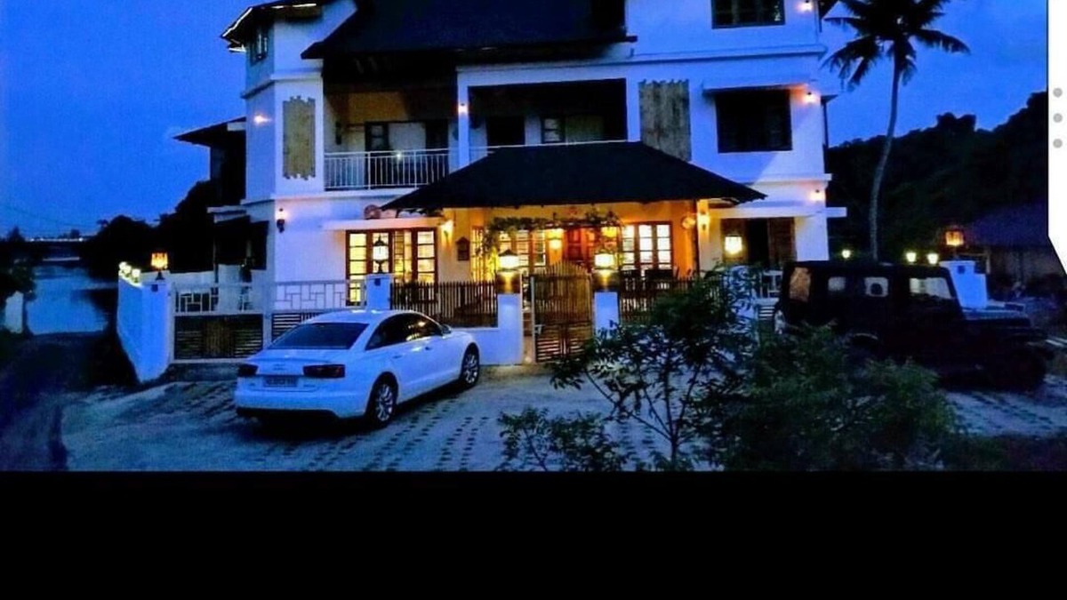 Kakkanad House | Stay In the city. But in a village ambience. Over looking the forest
