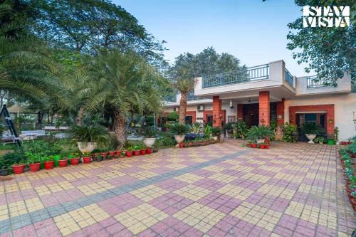 Sohna Villa | StayVista at Leela Retreat with BBQ, Bonfire, Pool & Lawn