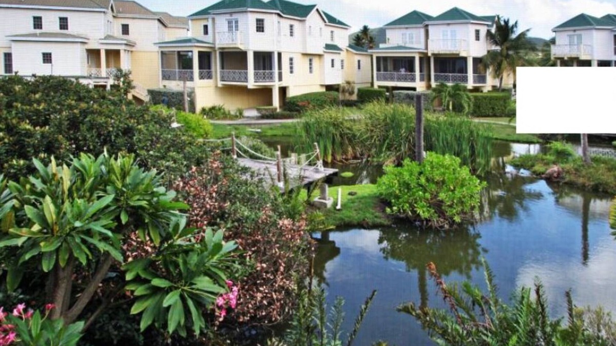 Charlestown Condo | Step from Condo or restaurant, onto the beach and into the pool 30 meter radius.