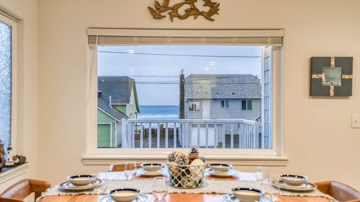 Nelscott House | Steps to the beach, ocean view, deck, BBQ, pet friendly with a fenced in yard