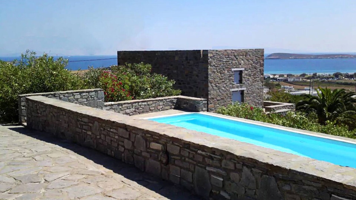 Chrissi Akti House | StoneHouse by the pool