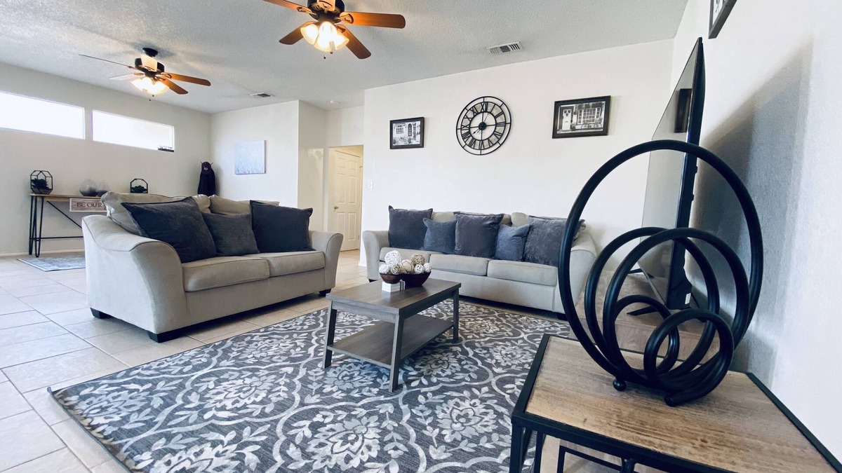 Midland Condo | String light condo with chic brick interior