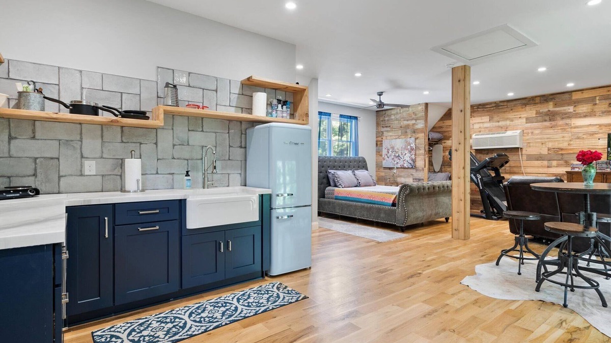 Matthews House | Studio above a detached garage away from main house on a private lot.