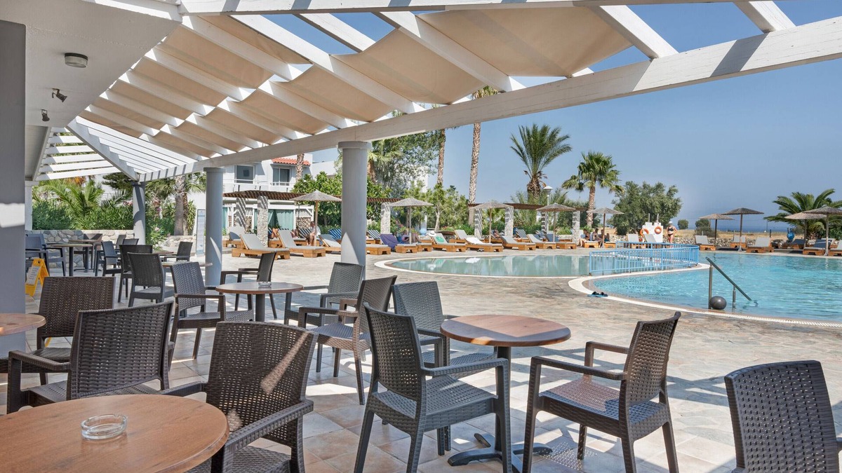 Kardamena Apartment | Studio Apartment 'Evripides Triple Room 1' with Shared Pool, Shared Garden and Air Conditioning