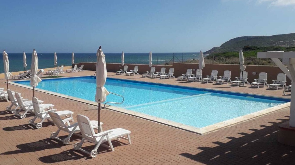Lu Bagnu Resort | Studio in Residence La Perla Del Mare, with pool, 100 meters from the beach.