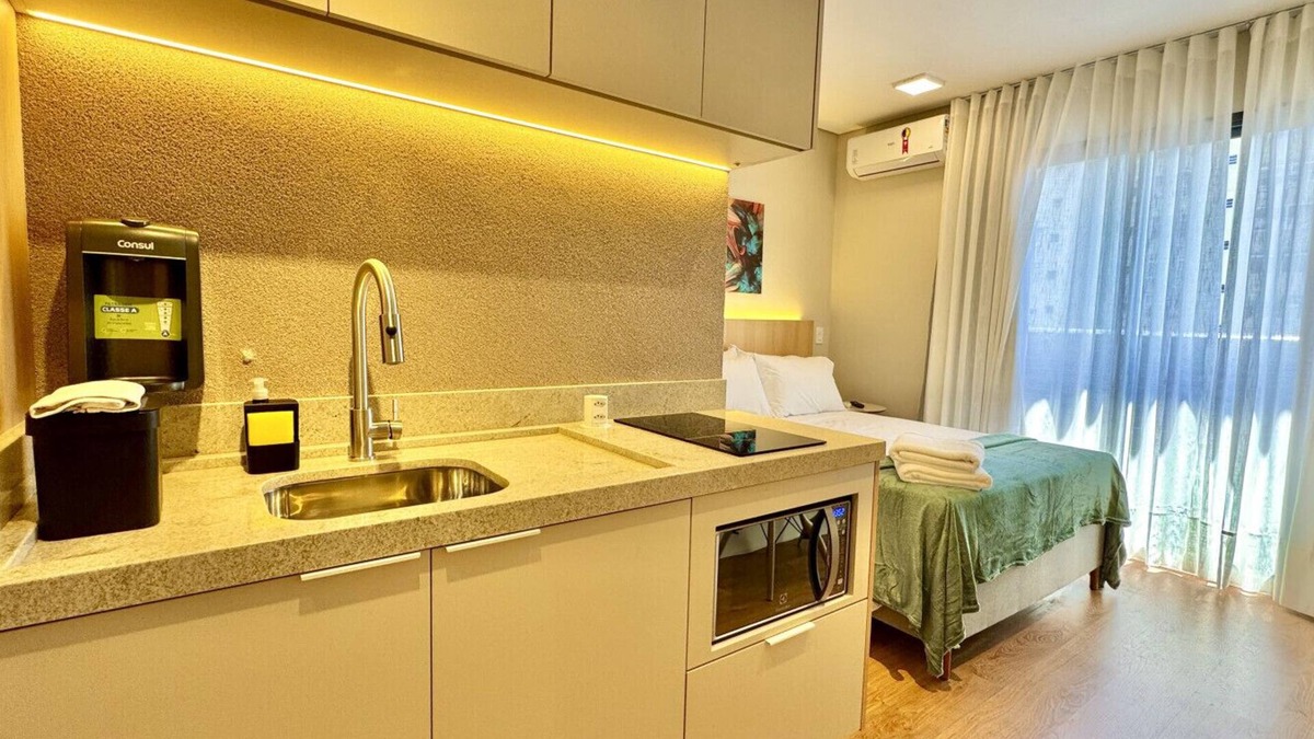 Matriz Apartment | Studio near Shopping Mueller complete with parking space and air conditioning
