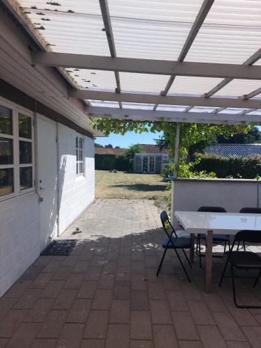 Odense Apartment | Stuelejlighed med have og overdækket terrasse