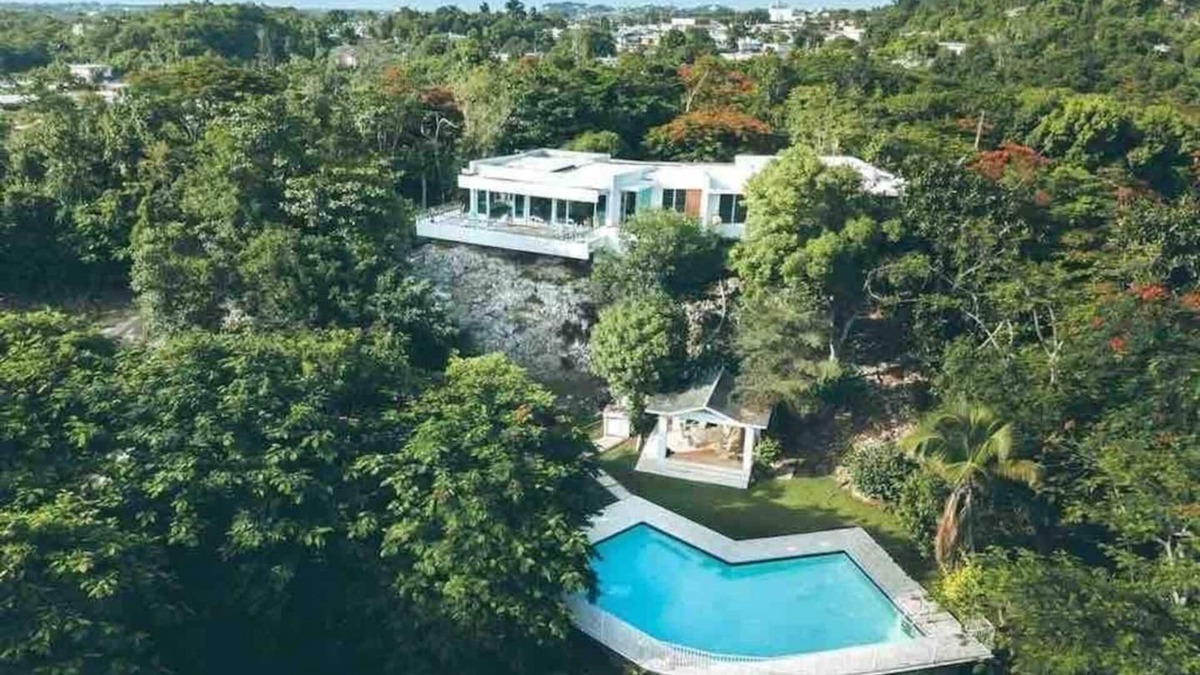 Borinquen Villa | Stunning 1950's grand house nestled in lush greenery overlooking the bay