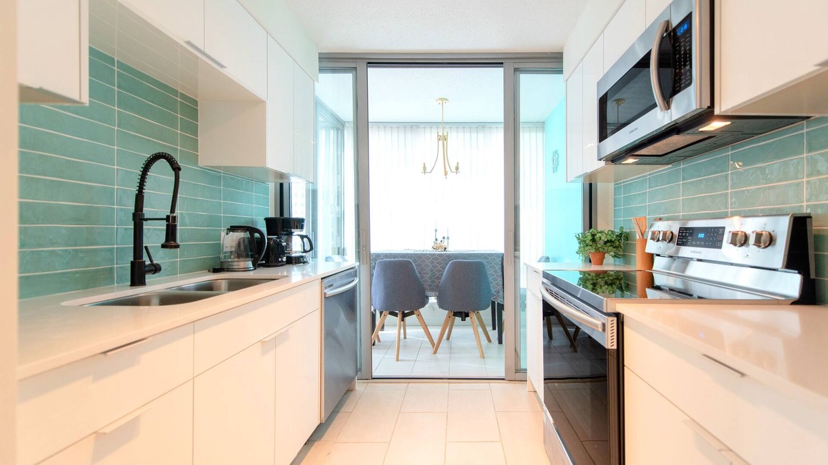 West End Apartment | Stunning 2-Bedroom Downtown Apartment with Water Views & Gym Access
