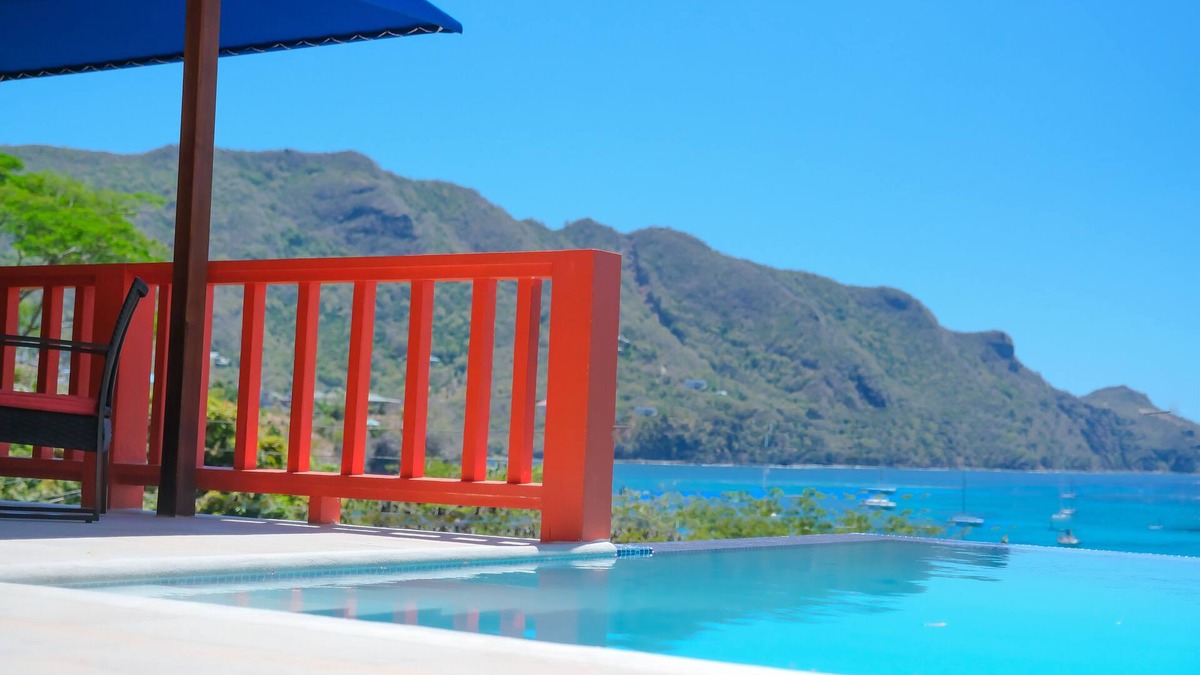 Richmond Villa | Stunning Beachfront Sunset Flamingo 4 Bedroom Villa sleeps 8 With Private Pool