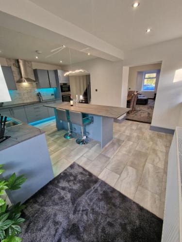 Aberdulais Villa | Stunning Modern Riverside Cottage