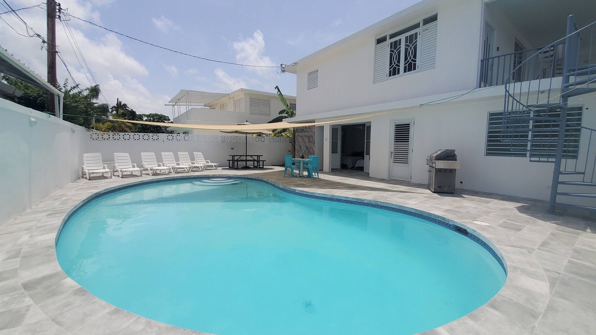Isla Verde House | Stunning Pool House- Private - Sleeps 26- 5 minute walk to Isla Verde beach!