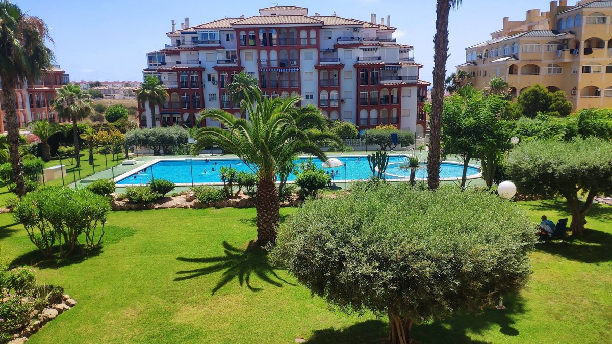 Torrevieja Apartment | Stunning Sea views, swimming pool in tropical garden, close to the sea, parking