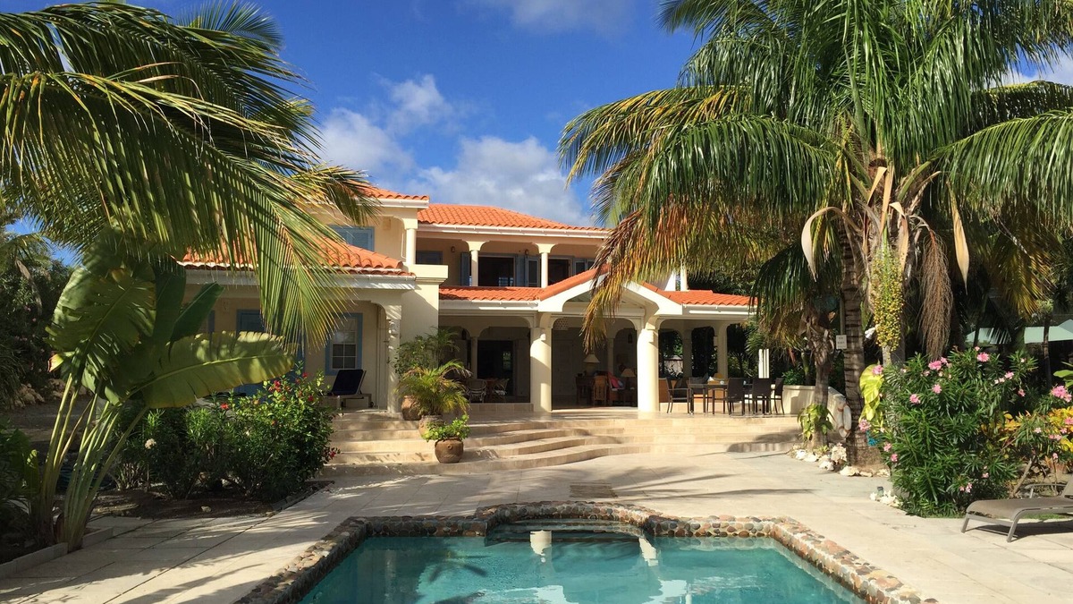 Falmouth Harbour Villa | Stunning six bedroom seafront villa with pool, garden and sea views