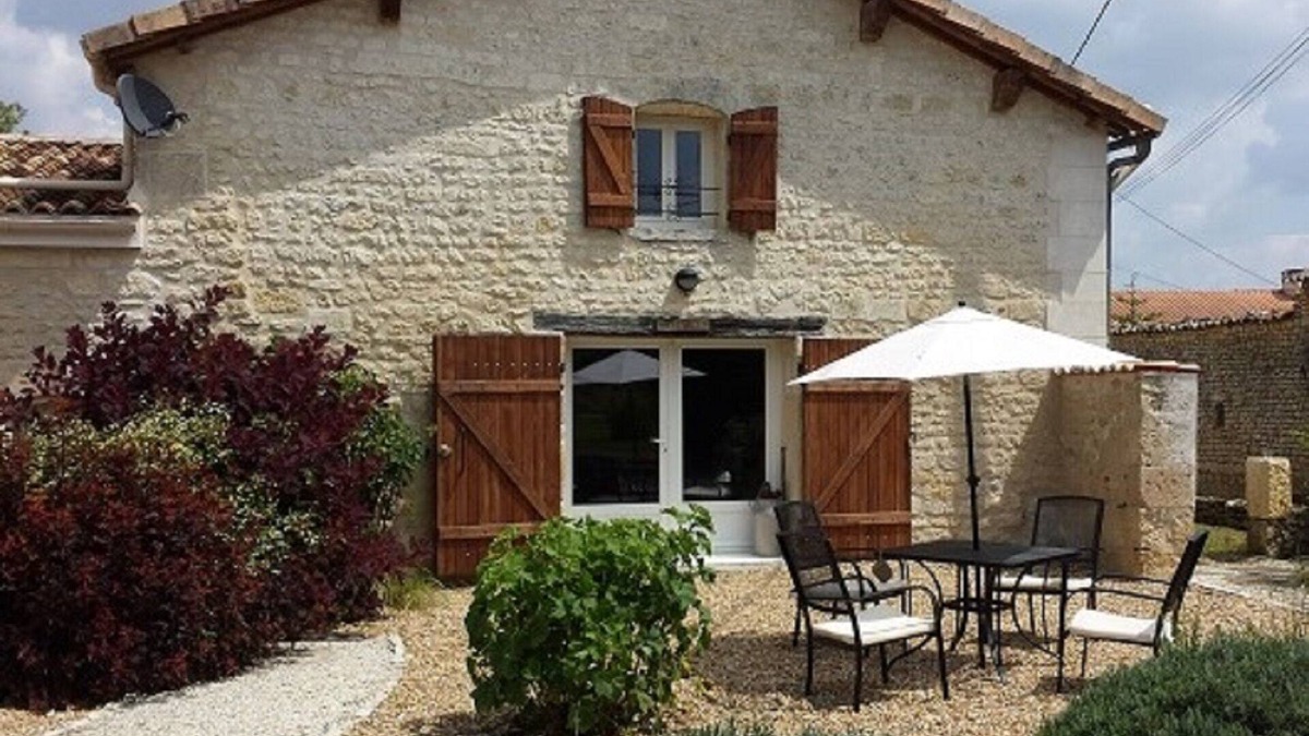 Bribaudon House | Stylish Family Friendly Gite, Village Location, with Shared Pool & Games Barn