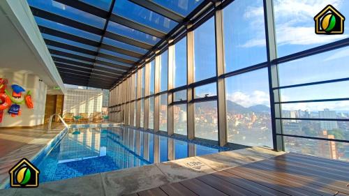 Chapinero Apartment | Stylish Loft with Pool, Sauna & Gym 24x7, Near Zona T!