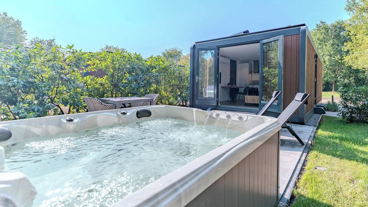 Maasbree House | Stylish two-person forest cabin with jacuzzi, set in nature with comfort, privacy and access to top-tier park facilities.