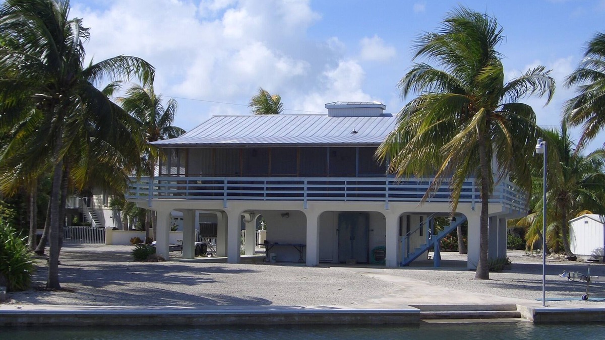 Sugarloaf Shores House | Sugarloaf Shores Wide Canal 3/3 Waterfront w/100 ft Seawall in Quite Community.