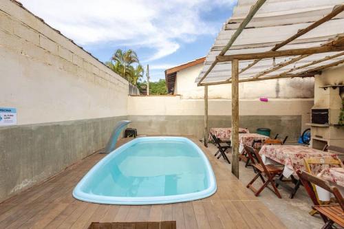 Centro Comercial Apartment | Suite passos da praia em Ilhabela