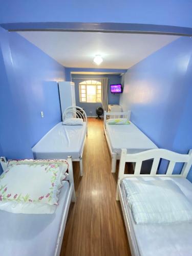 Cajuru House | Suite Privativa 1 - Jardim Botânico