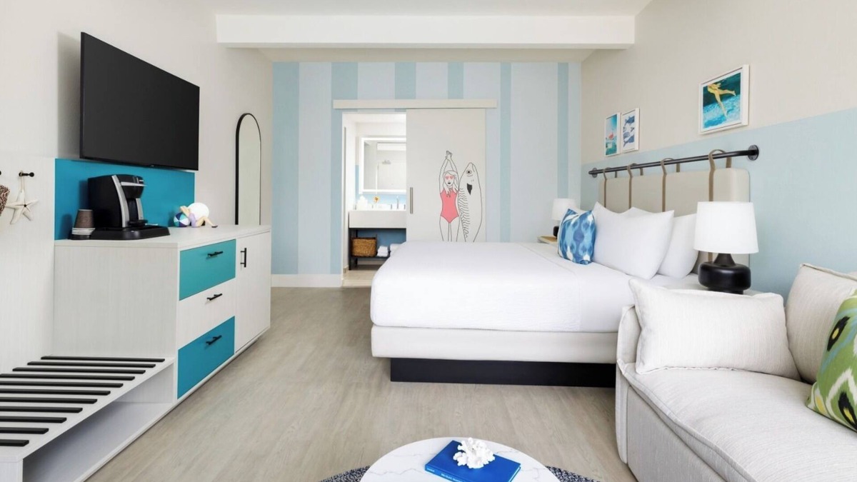 New Town Hotel | Sun, Sip, & Socialize | Island Stay with 2 Pools & Lawn Games
