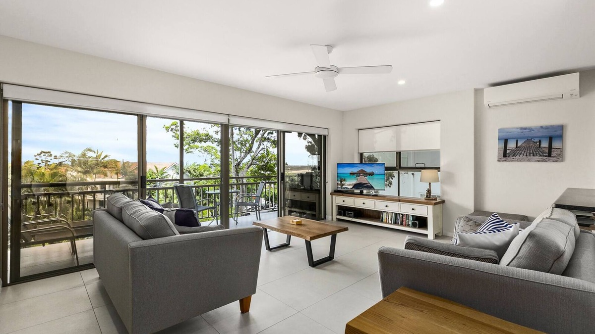 Noosa Heads Apartment | Sundowner 3 - A fantastic view over Laguna Bay to the Noosa North Shore beach.