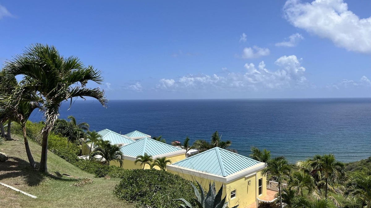 Estate Concordia East House | Sunflower - Amazing view of the Caribbean Sea, pool & lush tropical landscaping