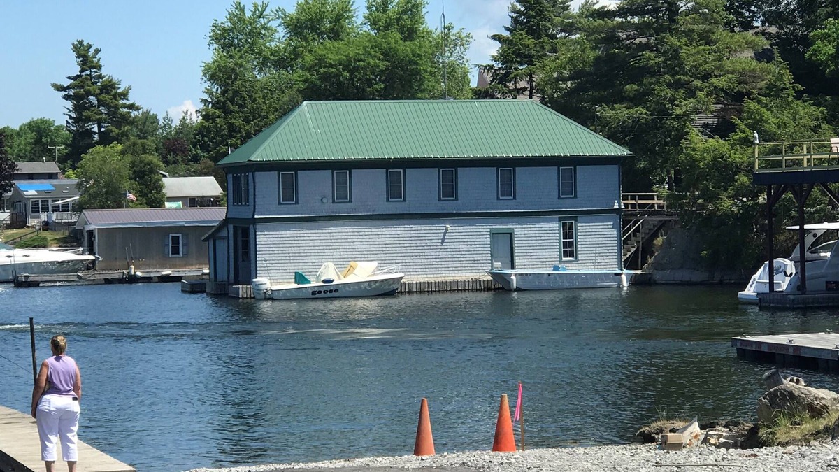 Fishers Landing Cottage | Sunny cottage built over the water on the St. Lawrence River