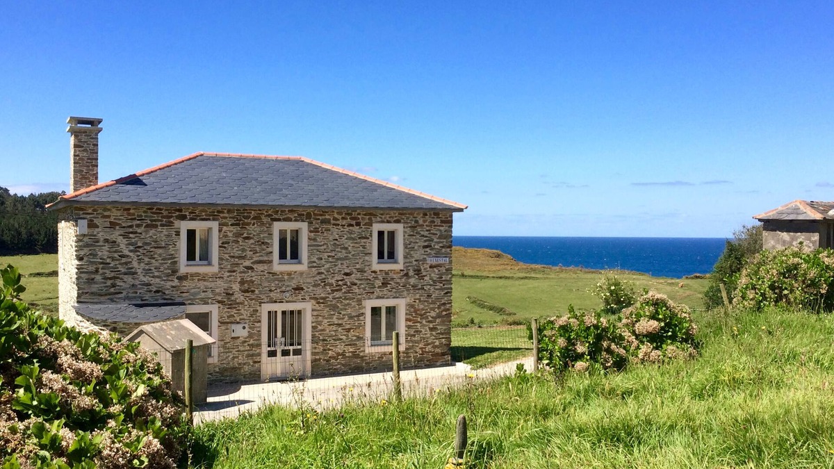 Ortigueira House | Sunny country cottage with garden located steps from several stunning beaches.
