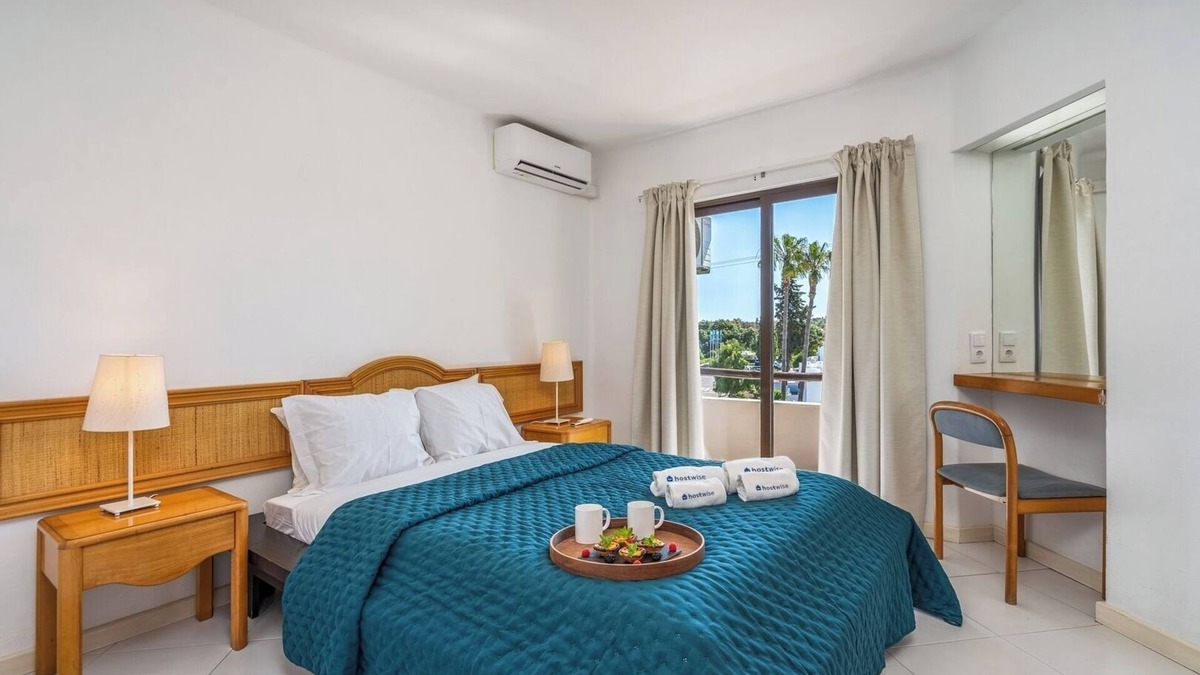 Alpouvar Apartment | Sunny Flat with a Balcony and Pool by HostWise