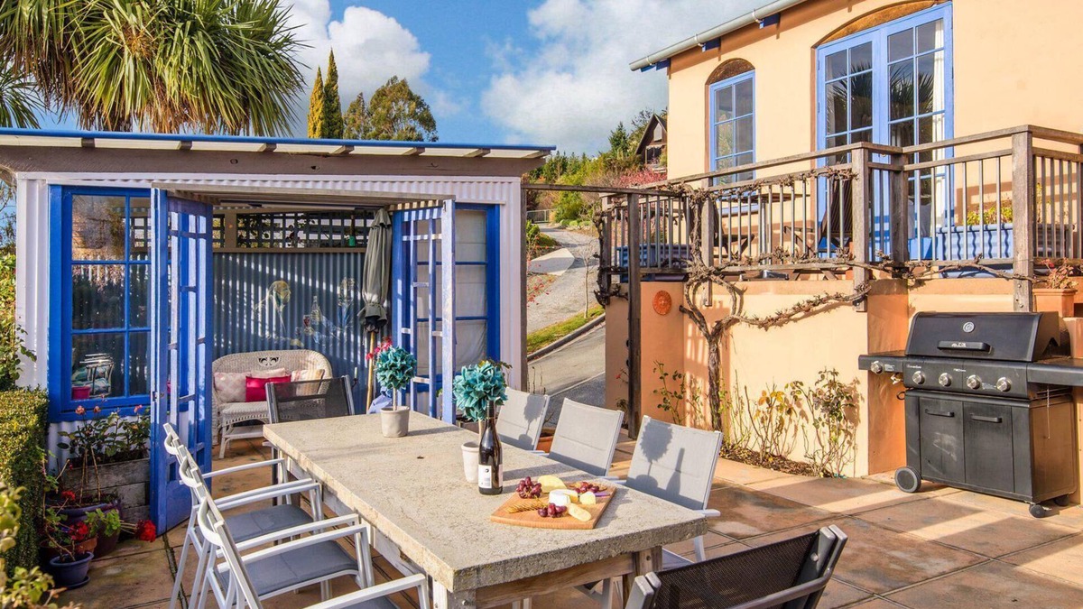 Kelvin Heights House | Sunny Lakeview Villa | Outdoor living | Hot Tub