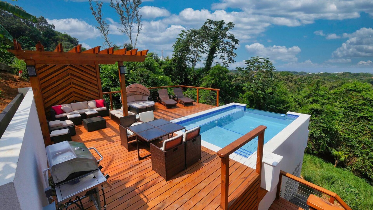 Sandy Bay House | Sunset and Ocean views at Sandy Feet Retreat with private infinity pool.