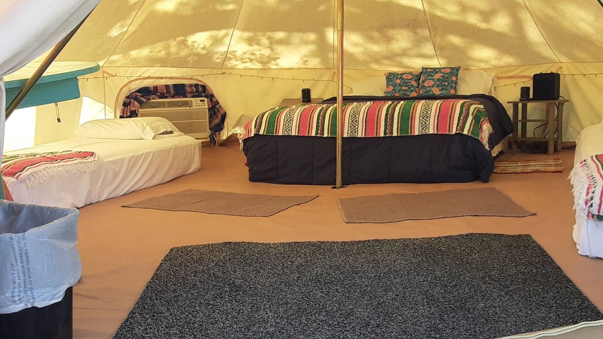 Spring Branch RV Rental | Sunset Ridge Glamp Tent Queen Bed, 2 cots, AC and Electric