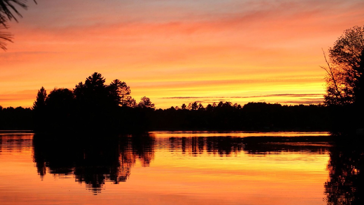 Tomahawk House | Sunset View Lake Home on Lake Mohawksin, Sand Frontage