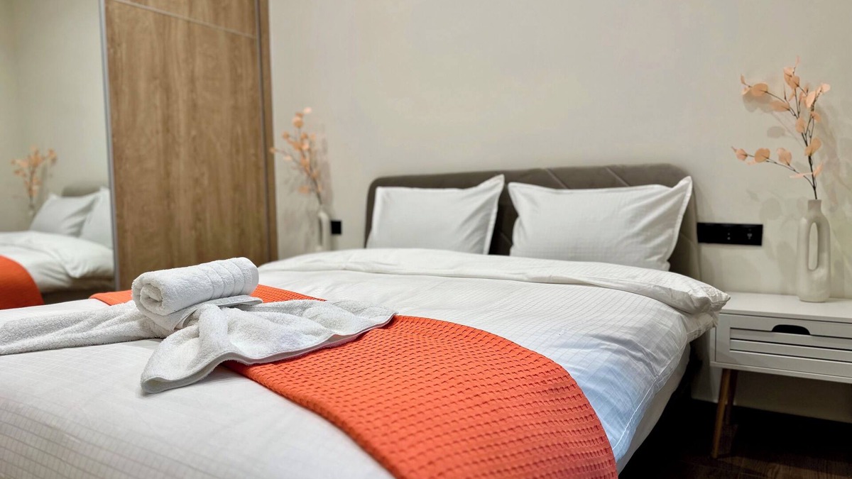 Petralona Apartment | T&T Black Wood & Gold Elegance