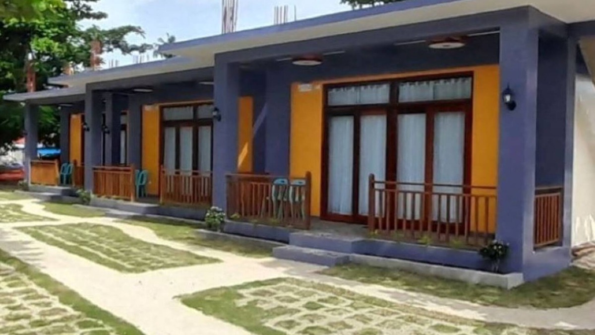 Catangnan Resort | Takbo Beach Resort - Cabana 2- Two Queen Size Beds with amenities