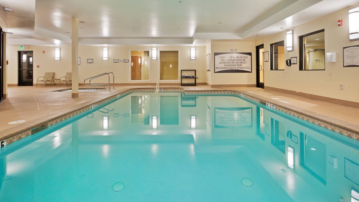 Reno/Tahoe Airport Condo | Take a dip in the Shared Pool! Near Reno-Sparks Convention Center | 1 Bedroom Suite