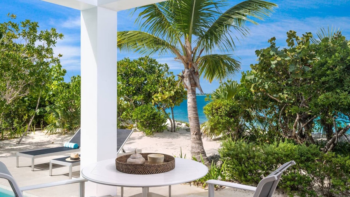 Providenciales House | TC Villas -Water Edge Villa -Beachfront on Grace Bay Beach