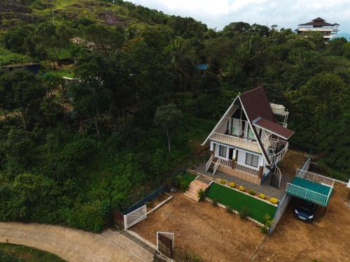 Todupulai House | Tea haven by Yathroam