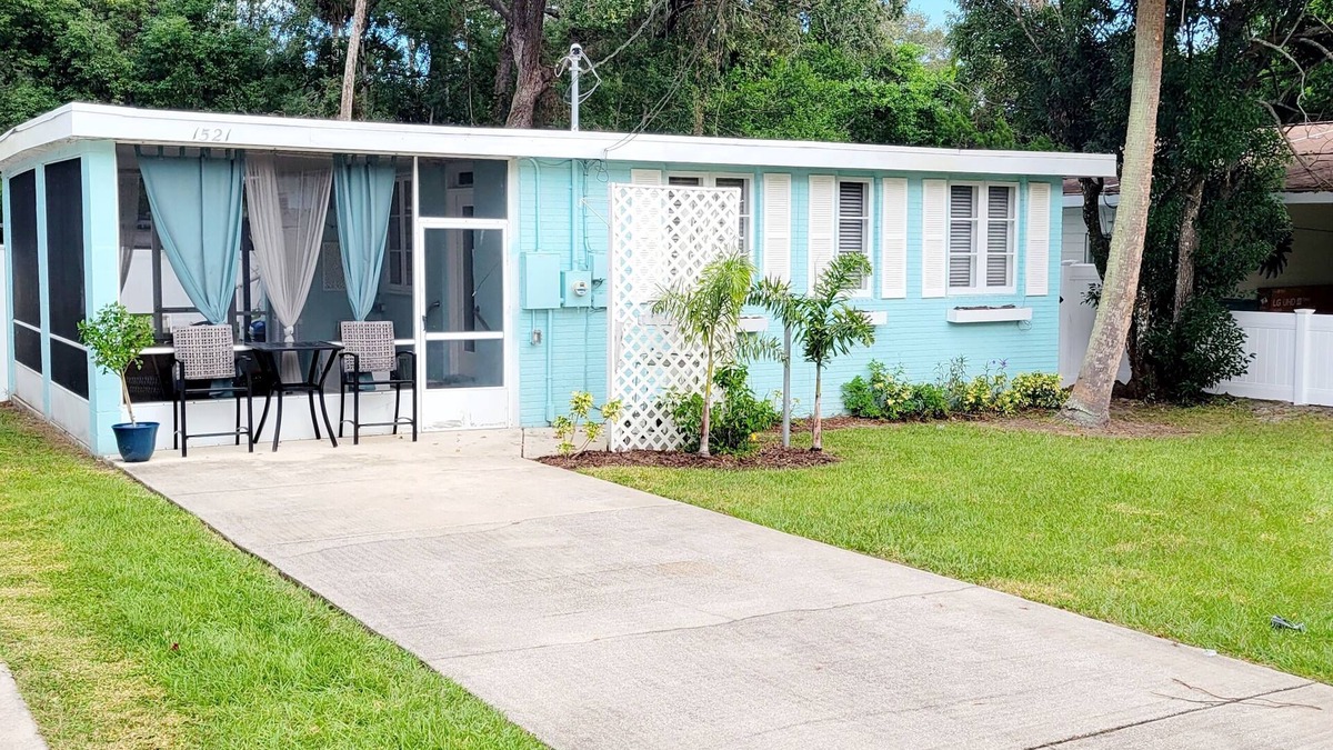 Elizabeth Mcbrides Raulersons House | The Adorable Blue Bungalow- Pet Friendly with a fully fenced in back yard.