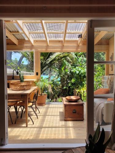 Tryphena House | The Bay Cottage - Located Directly Across the Road from 2 Swimming Beaches