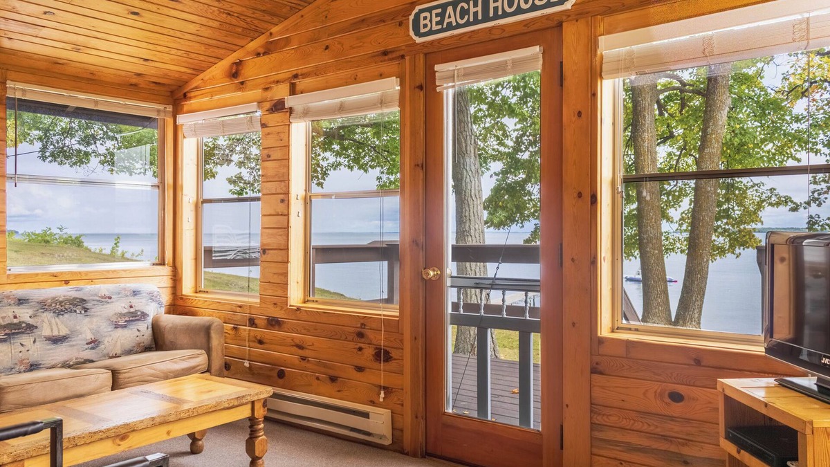 Walker Cabin | The Beach House Leech Lake - King bed &wall of windows just steps from the lake.